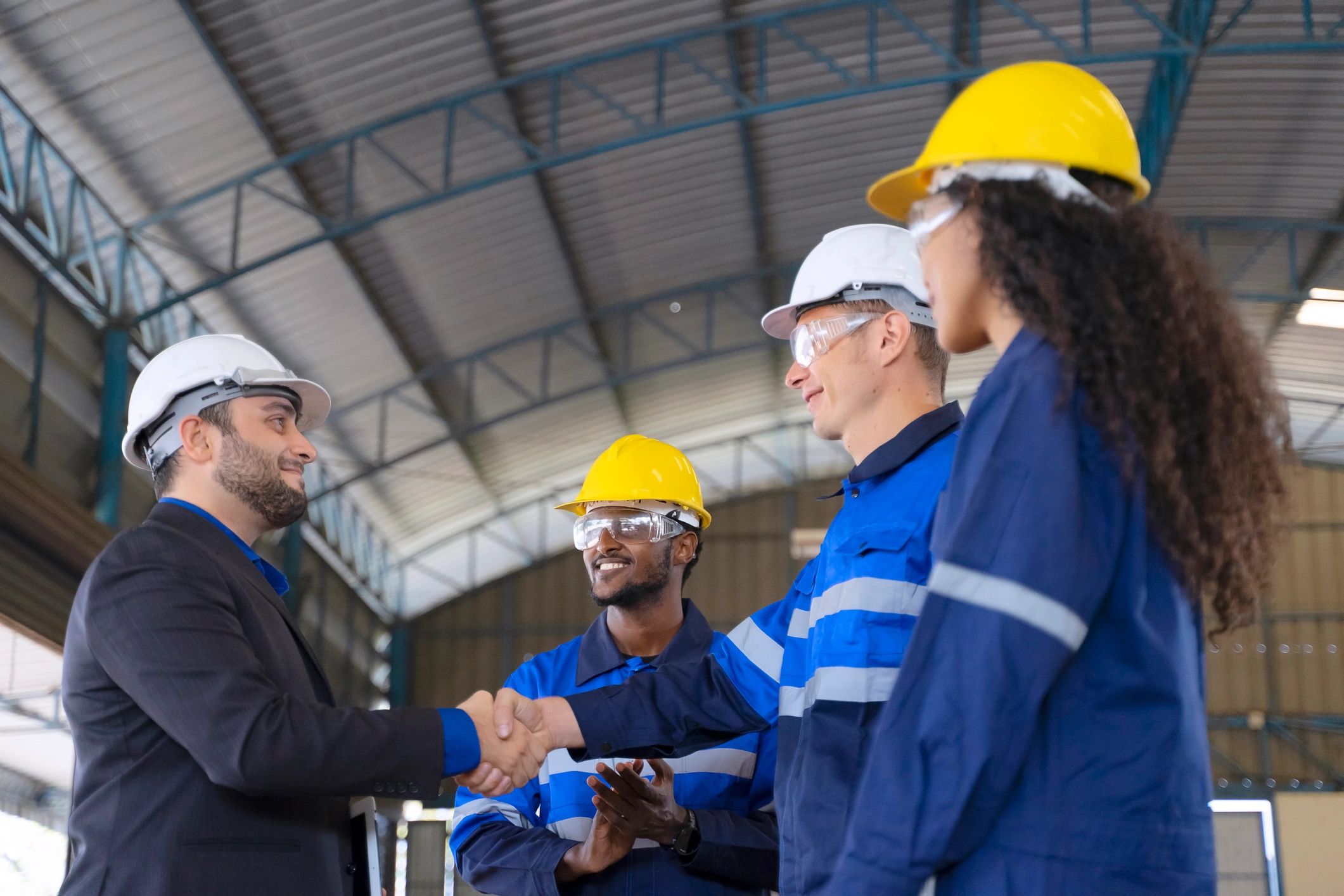 Industrial engineering team working in a factory setting
